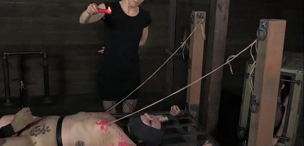  BDSM slave Mollie Rose covered in wax
